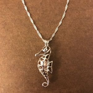 Sea horse necklace with real pearl inside